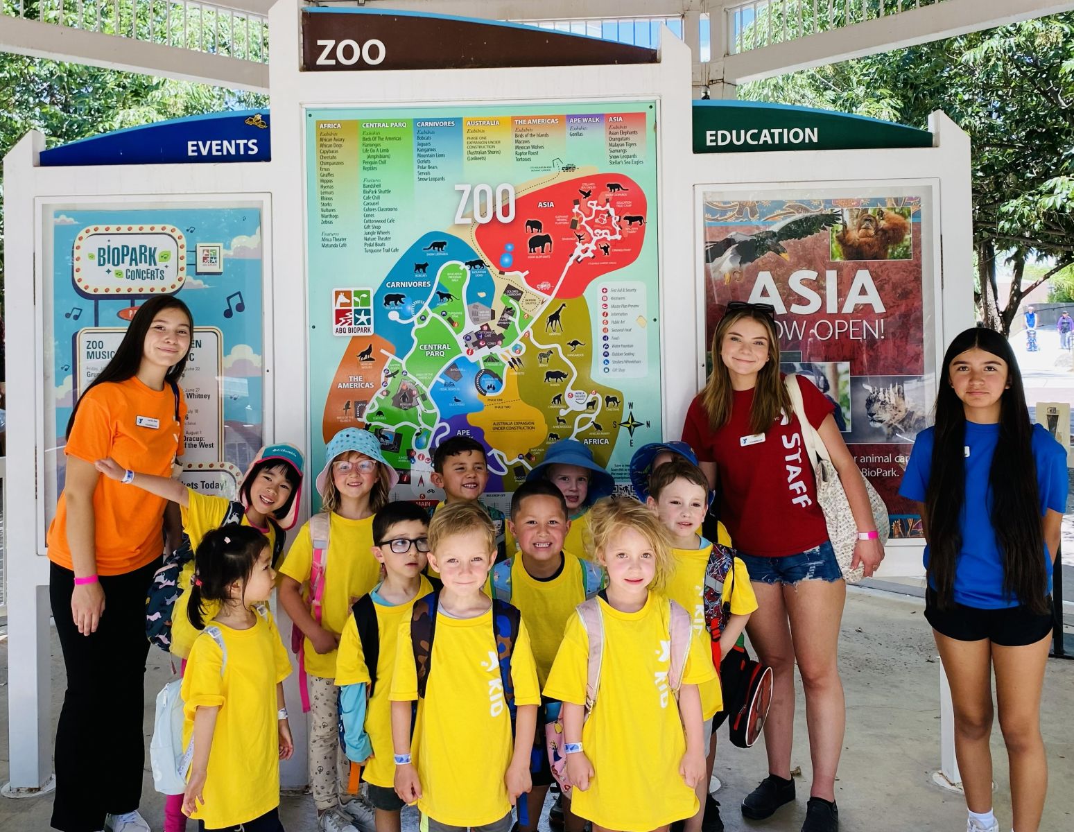 Children and caregivers enjoying summer camp activities