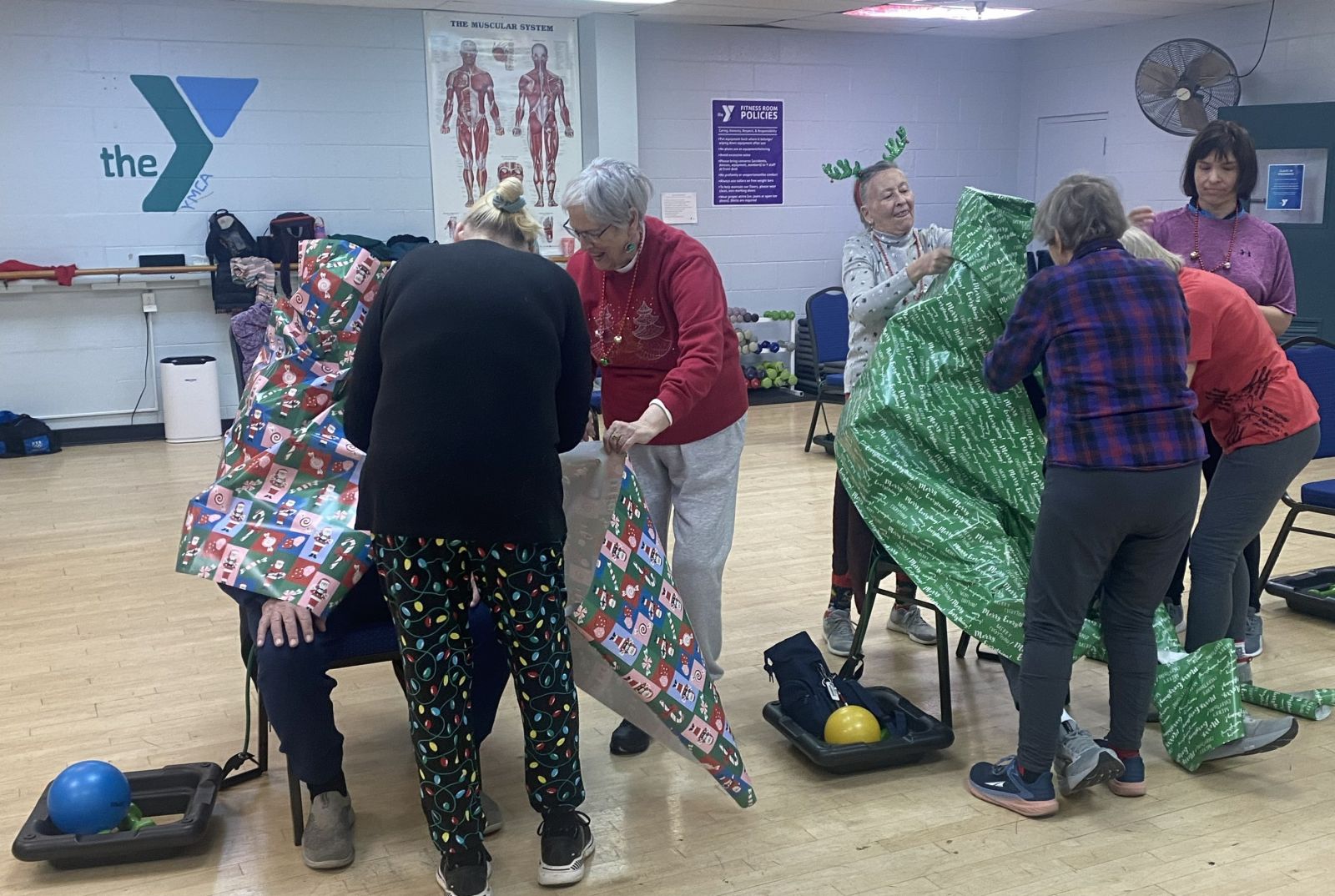 Older adult exercising in a wellness facility
