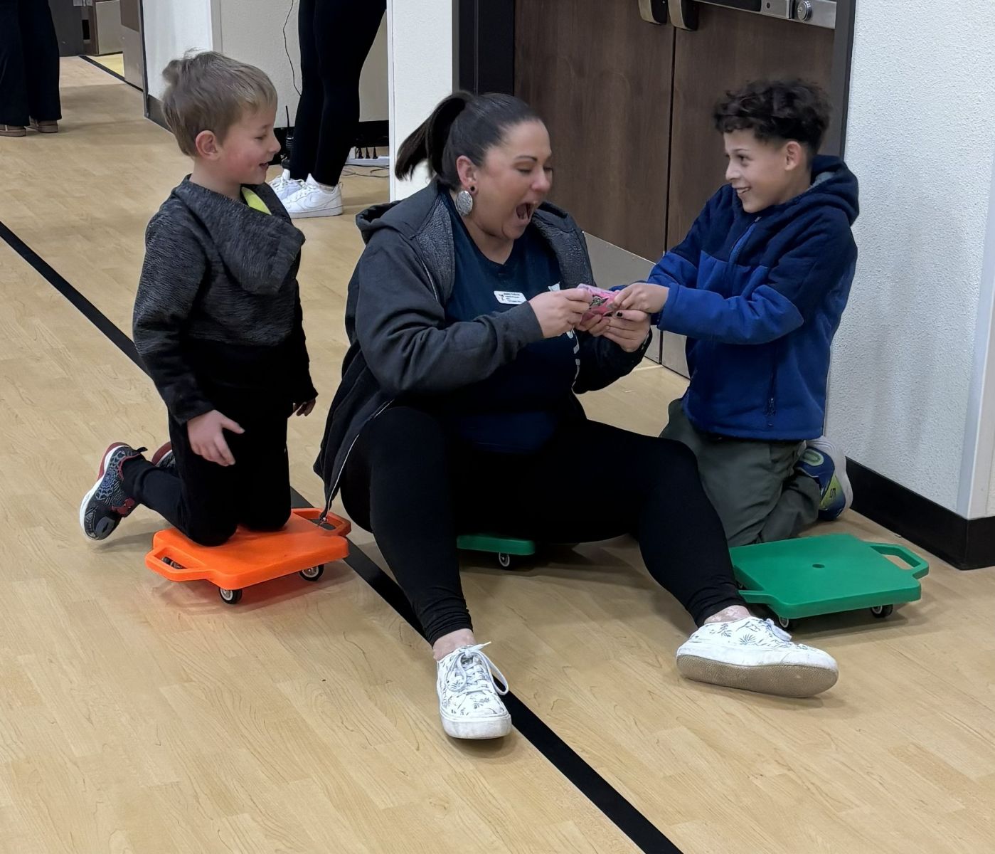 Children in afterschool care with caring staff